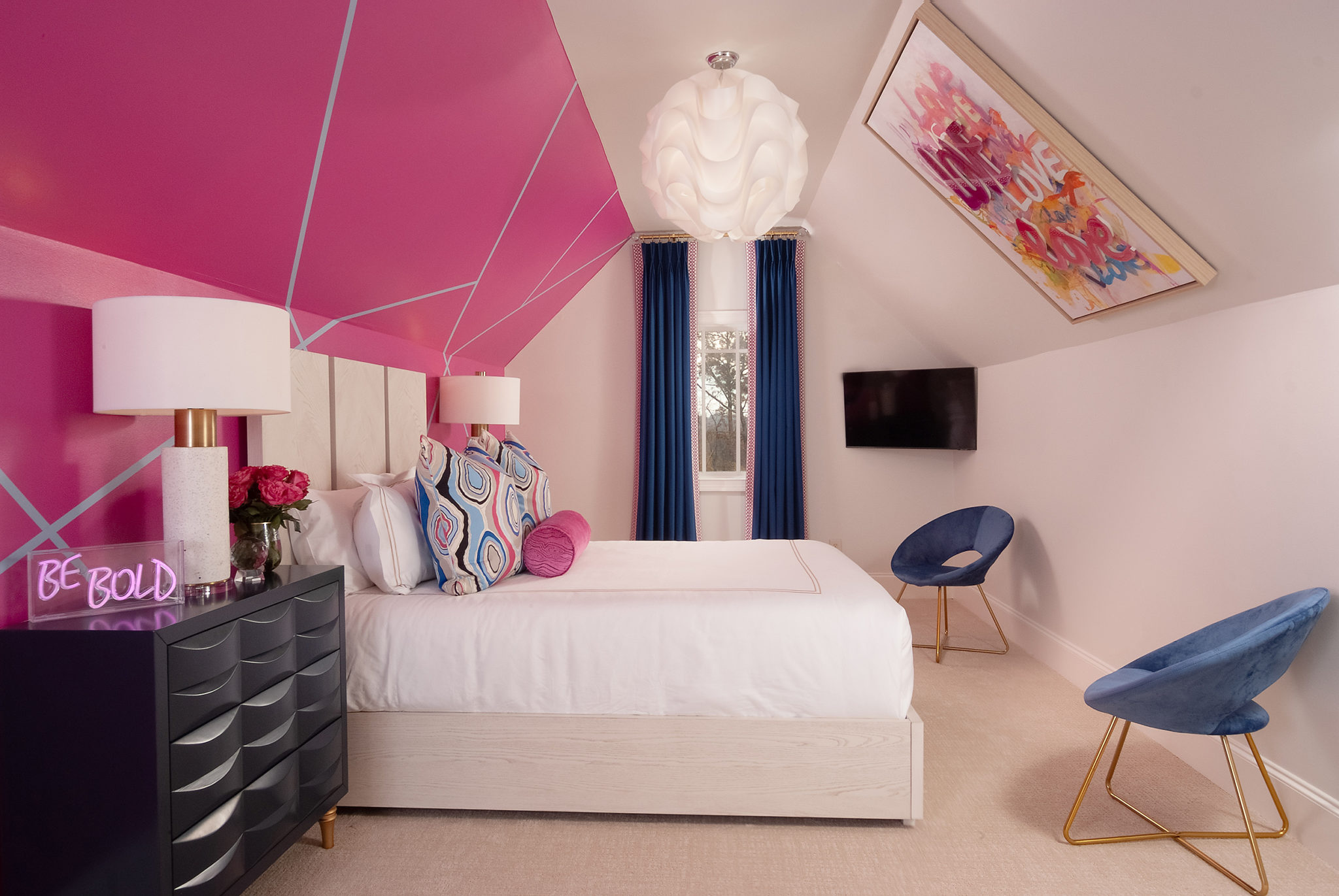 hot pink room with blue curtains